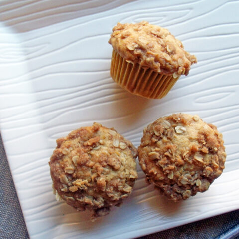 Peach cobbler muffins | One Mama's Daily Drama --- This yummy recipe has all the flavor of peach cobbler, baked into a muffin. It's perfect for snacking and sharing!