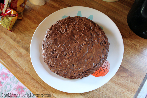 A 9-inch round brownie on a plate.