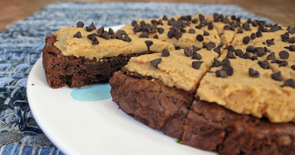 Peanut butter cheesecake brownies with chocolate chips sprinkled on top.