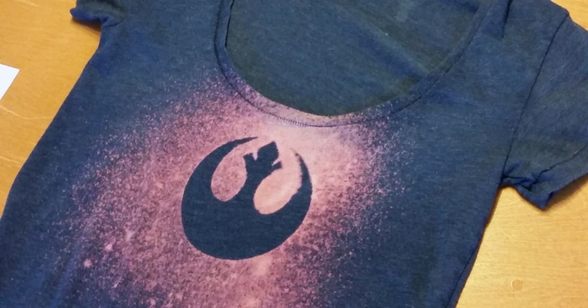 A pink and blue DIY bleach shirt with the Star Wars rebels logo.