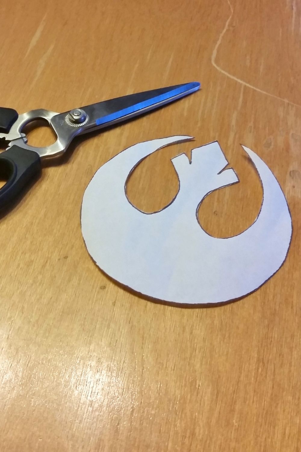 Rebel logo cut out from paper.