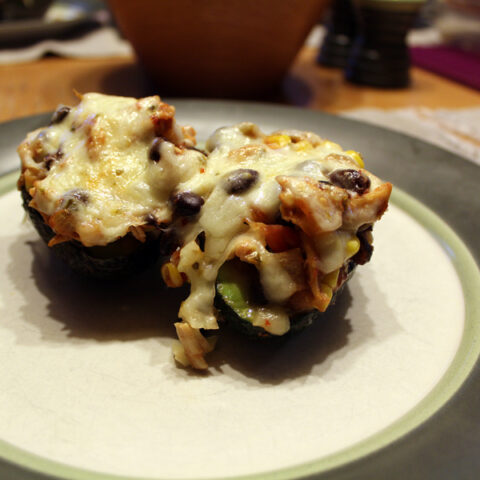Southwest stuffed avocados | from One Mama's Daily Drama --- Spicy chicken, beans, and cheese stuffed in an avocado half.