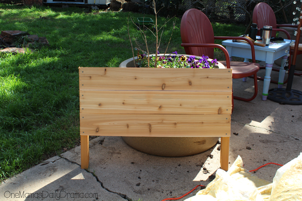 The short end of a raised garden bed.