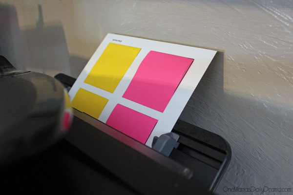 Loading the sticky note template into the printer.