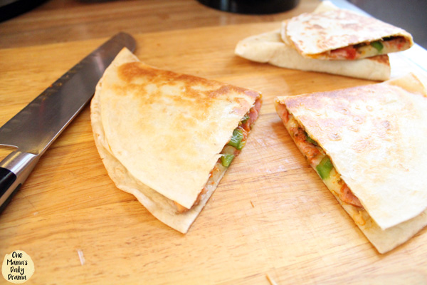 Cut the quesadillas in half