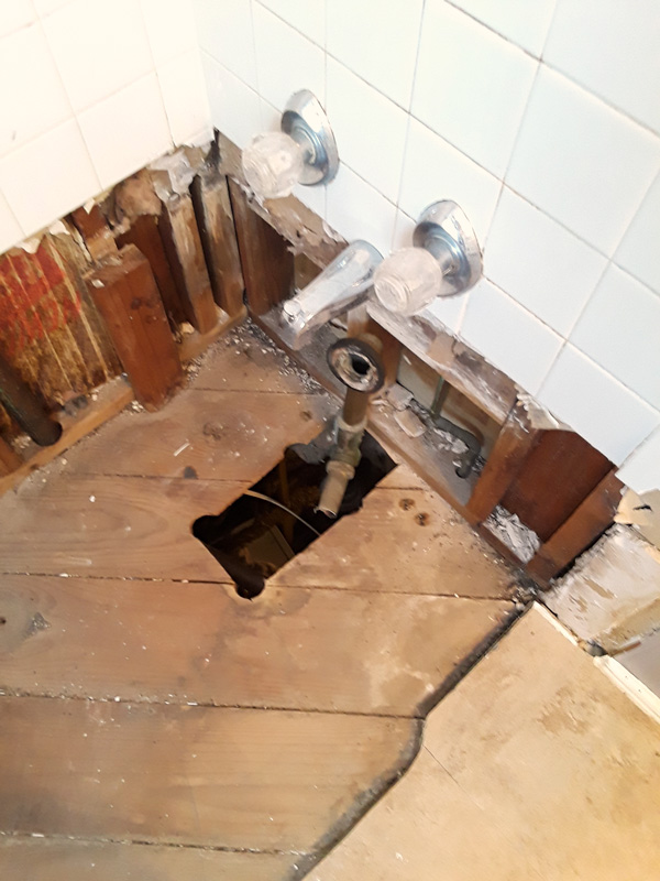 bathroom remodel: plumbing below the tub