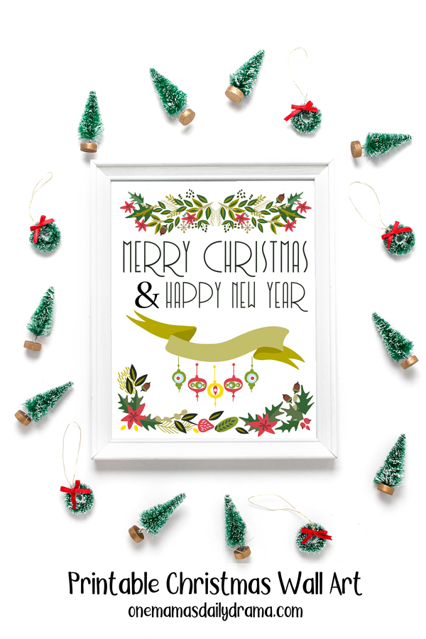 framed print of greenery with lettering "Merry Christmas & Happy New Year"