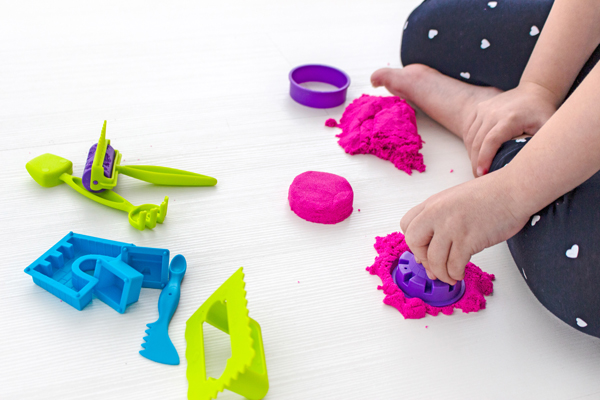 keep kids busy playing with colorful play dough on the floor