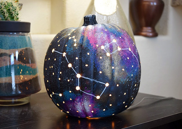 black, blue, and pink galaxy jack o' lantern with star holes for lights from Dream a Little Bigger