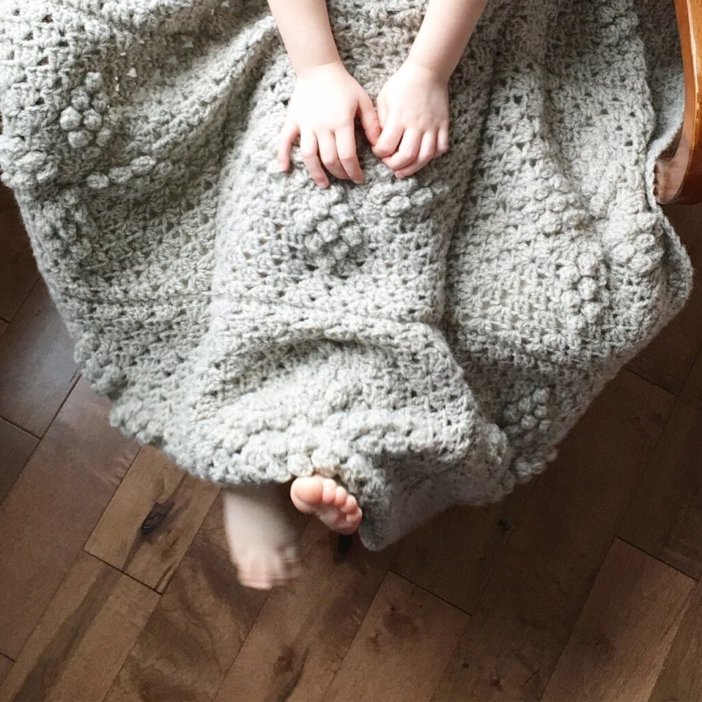 Gray crochet afghan from Sustain My Craft Habit.