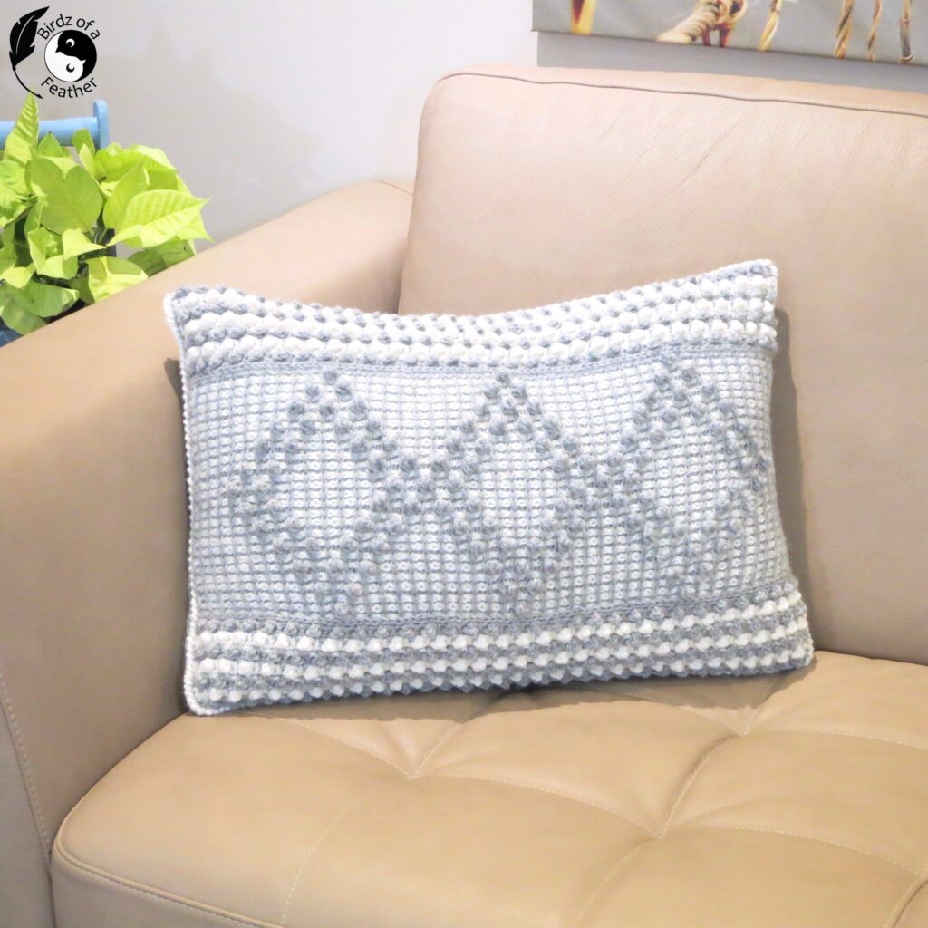 White crochet pillow from Birdz of a Feather.