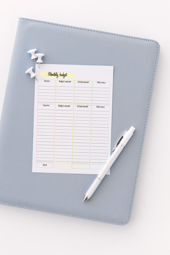 Monthly budget worksheet to track income and expenses.