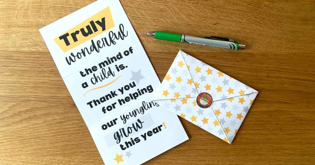 Star Wars teacher appreciation tri-fold card with matching envelope decorated in gold and gray stars.