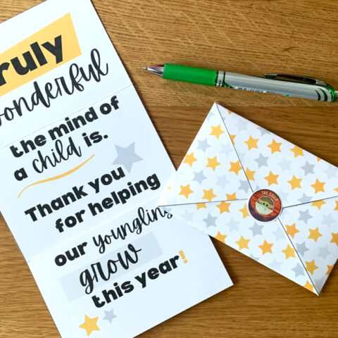 Star Wars teacher appreciation tri-fold card with matching envelope decorated in gold and gray stars.