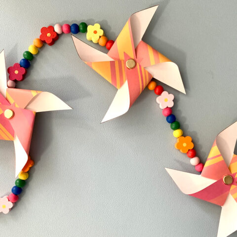 Mini paper pinwheels made from a printable template.
