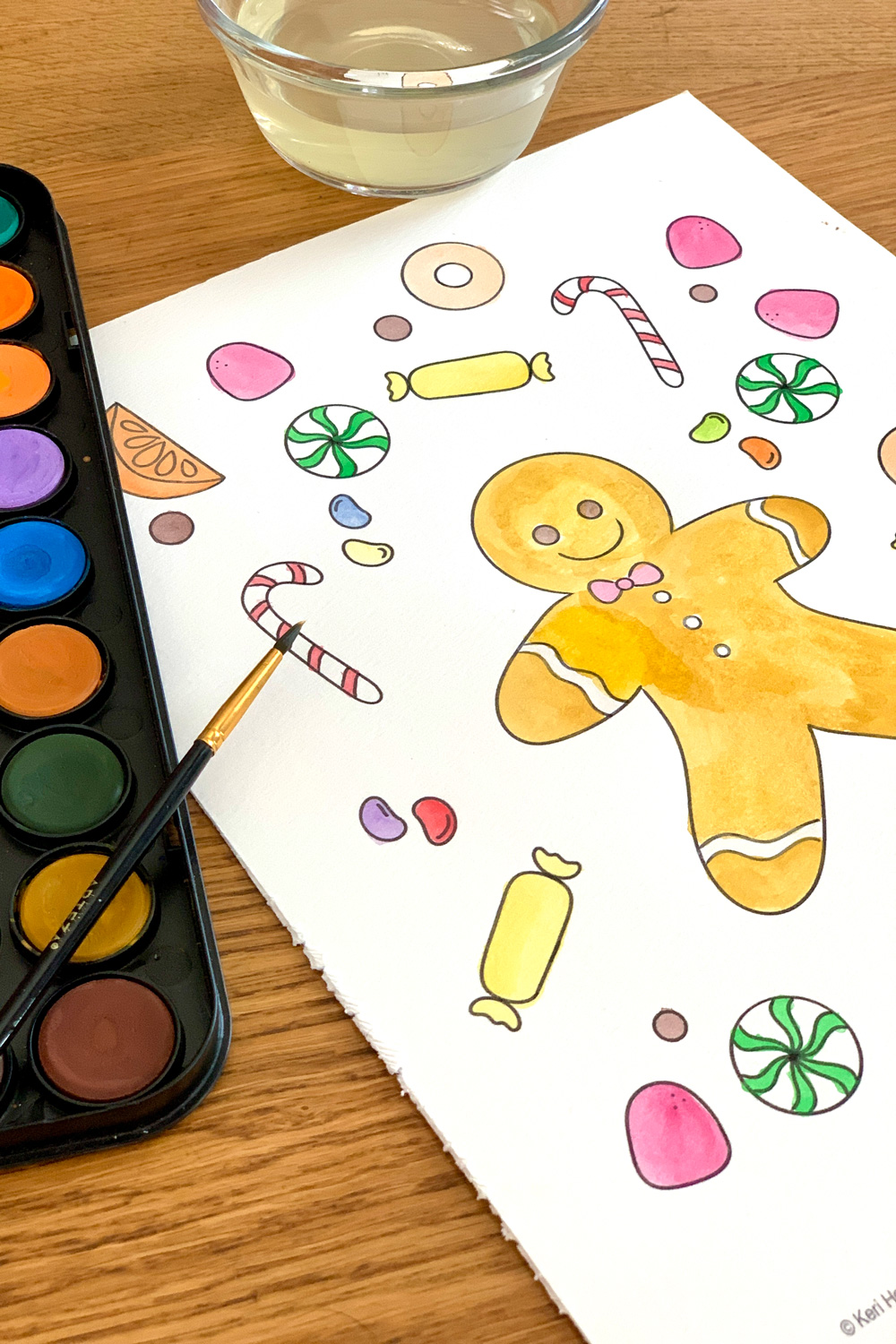 Watercolor painted gingerbread man coloring sheet.