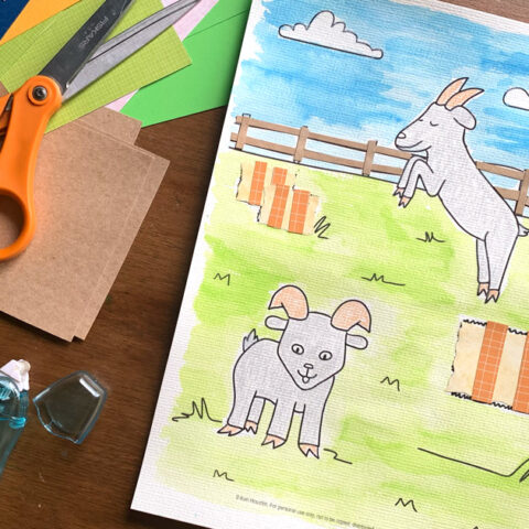 Mixed media goat coloring page with watercolored blue sky and green grass, gray crayon goats, and cut paper fence and hay bales.