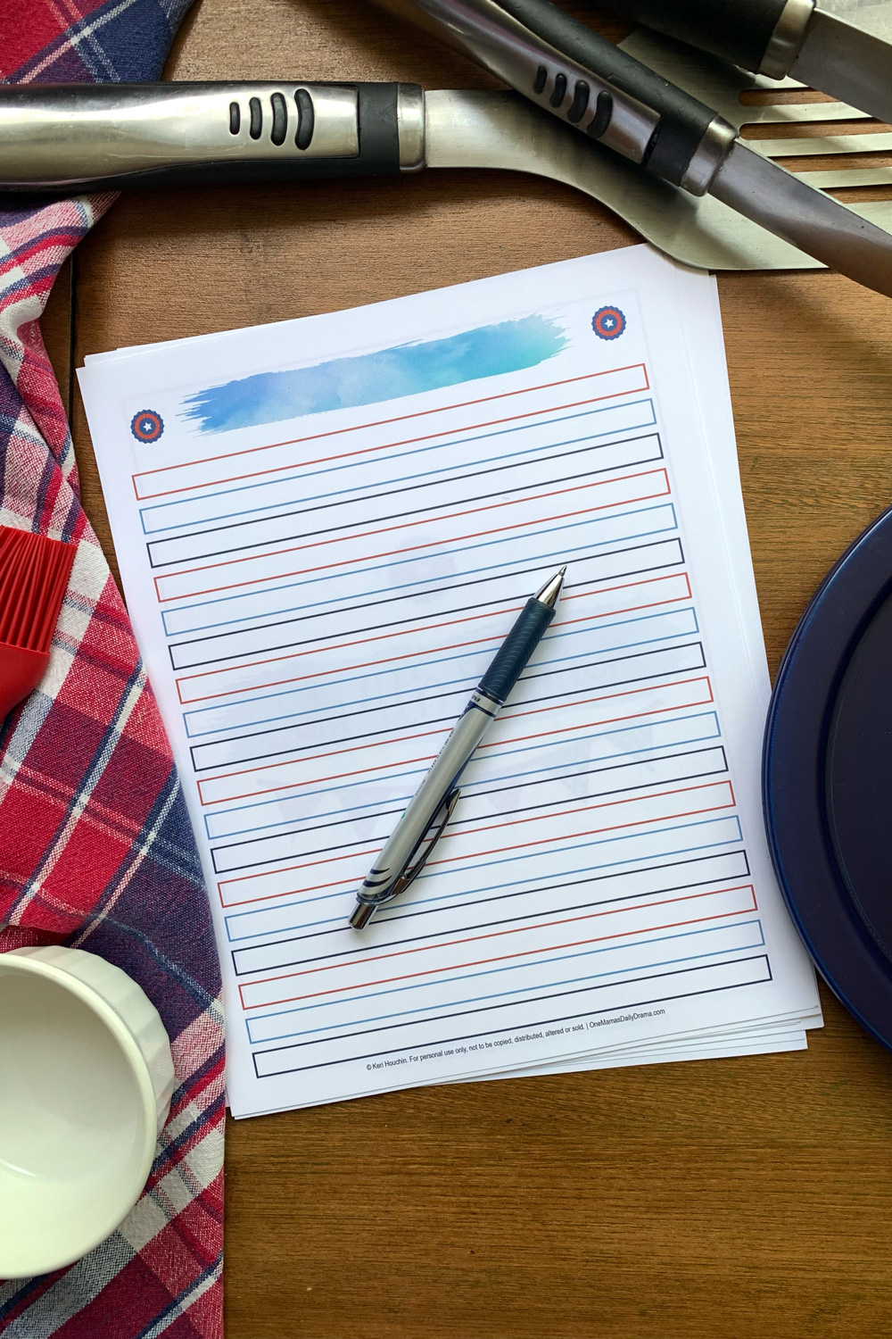 Red and blue lined paper with a blue watercolor stripe heading.