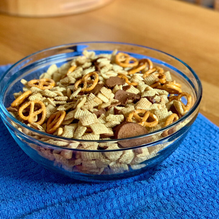 Classic chex mix made with cereal, rye chips, and pretzels.