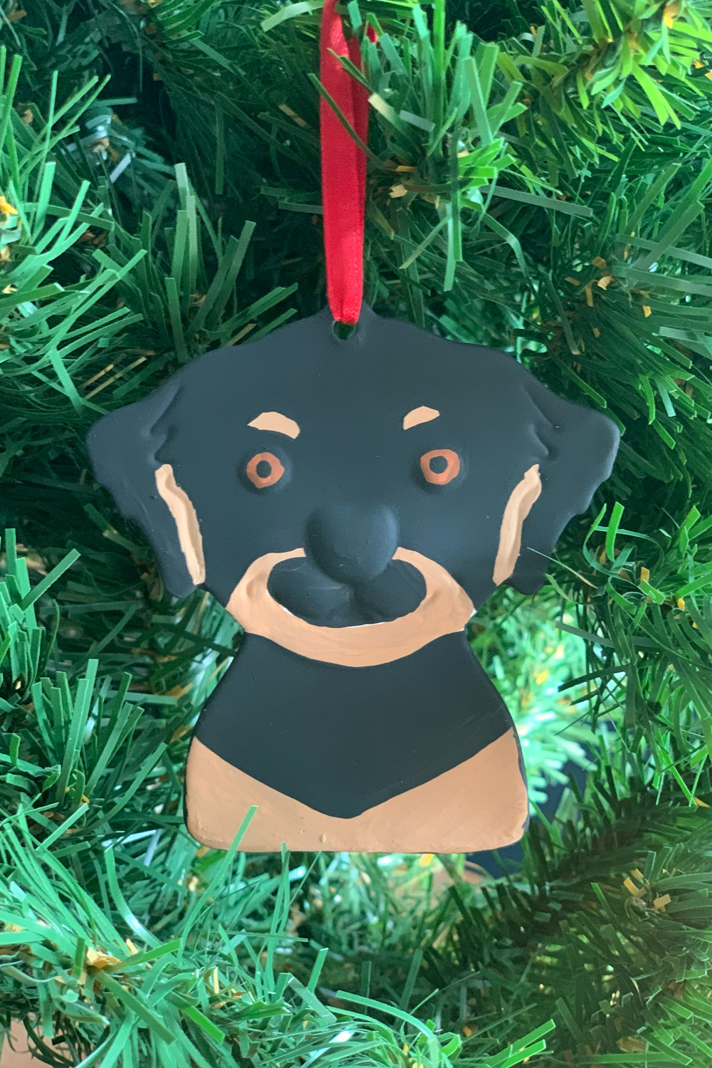 Black and tan dog ornament.