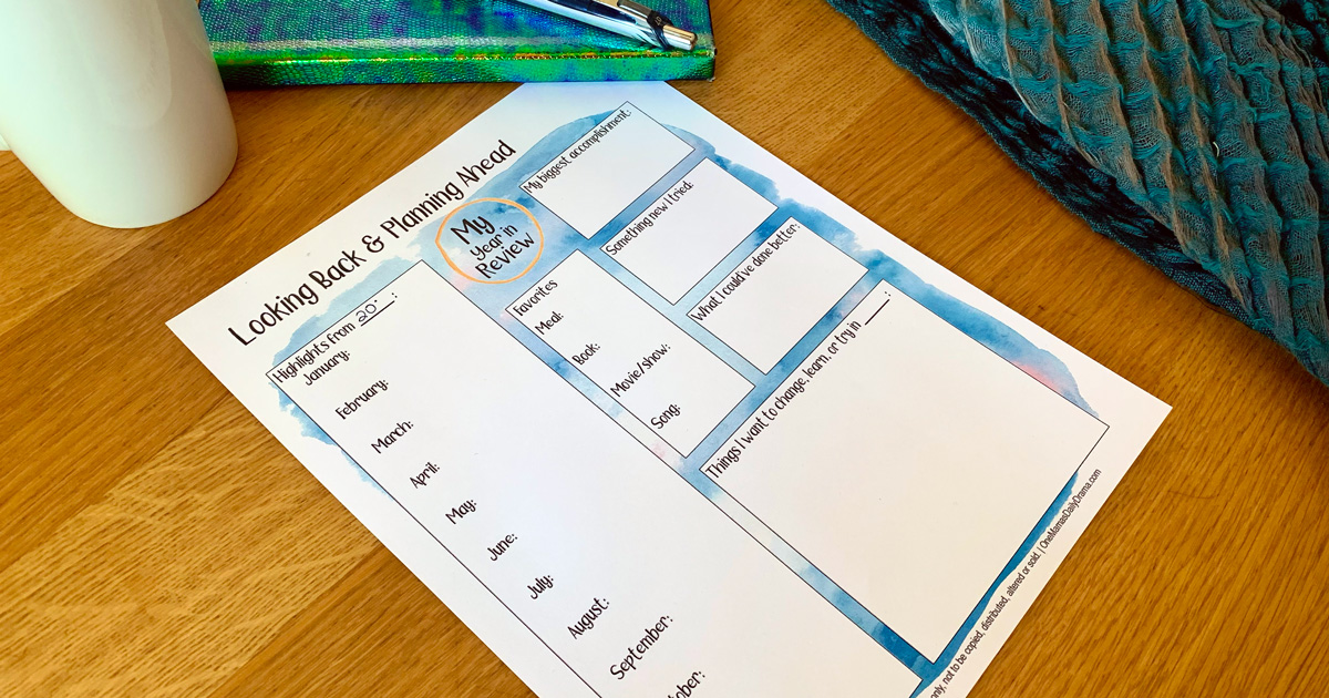 Printable year in review worksheet with space to write about each month, favorite things, and future goals.