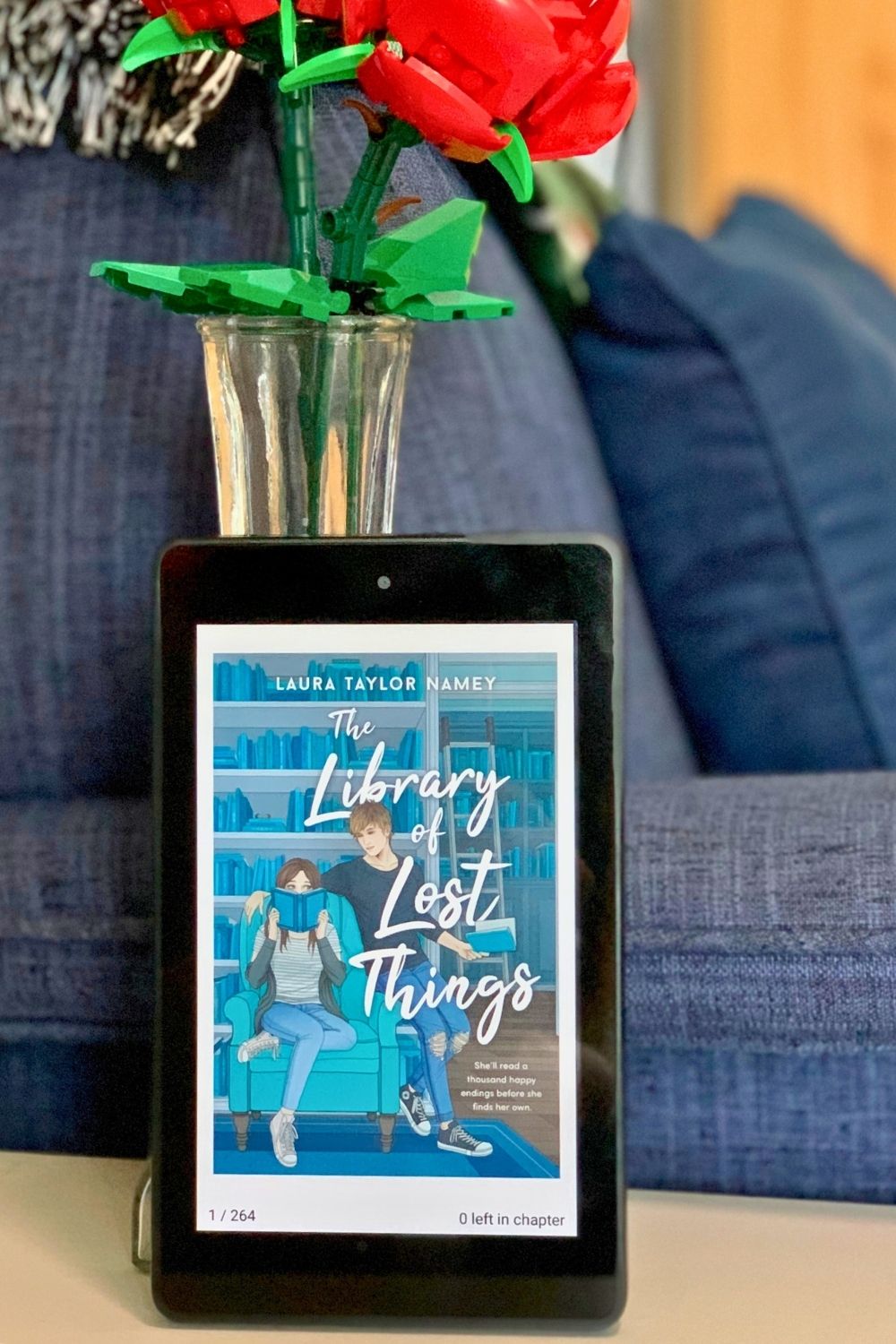 Kindle with ebook of The Library of Lost Things by Laura Taylor Namey.