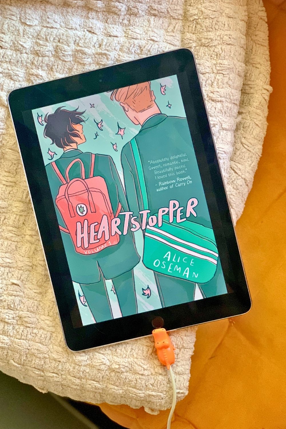 An iPad with the graphic novel Heartstopper by Alice Oseman.