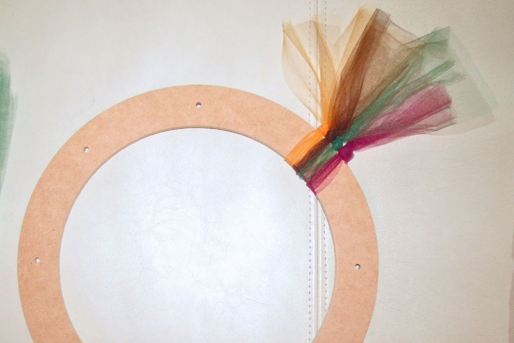 Pieces of tulle tied to a wreath form.