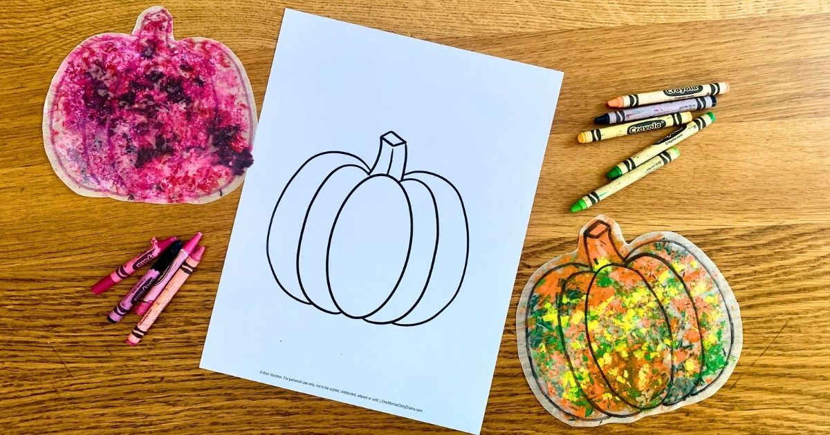 Melted crayon pumpkin craft made by melting crayon shavings between wax paper.