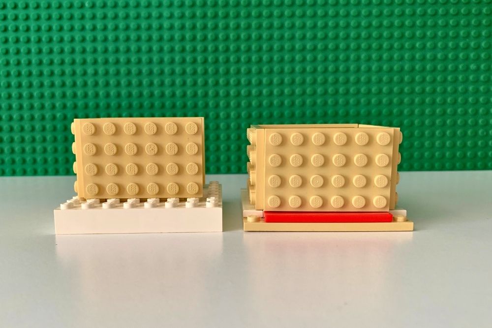 Two sets of walls built on a square base plate with additional baseplates as walls. One is slightly offset and the other is flush with smooth pieces.
