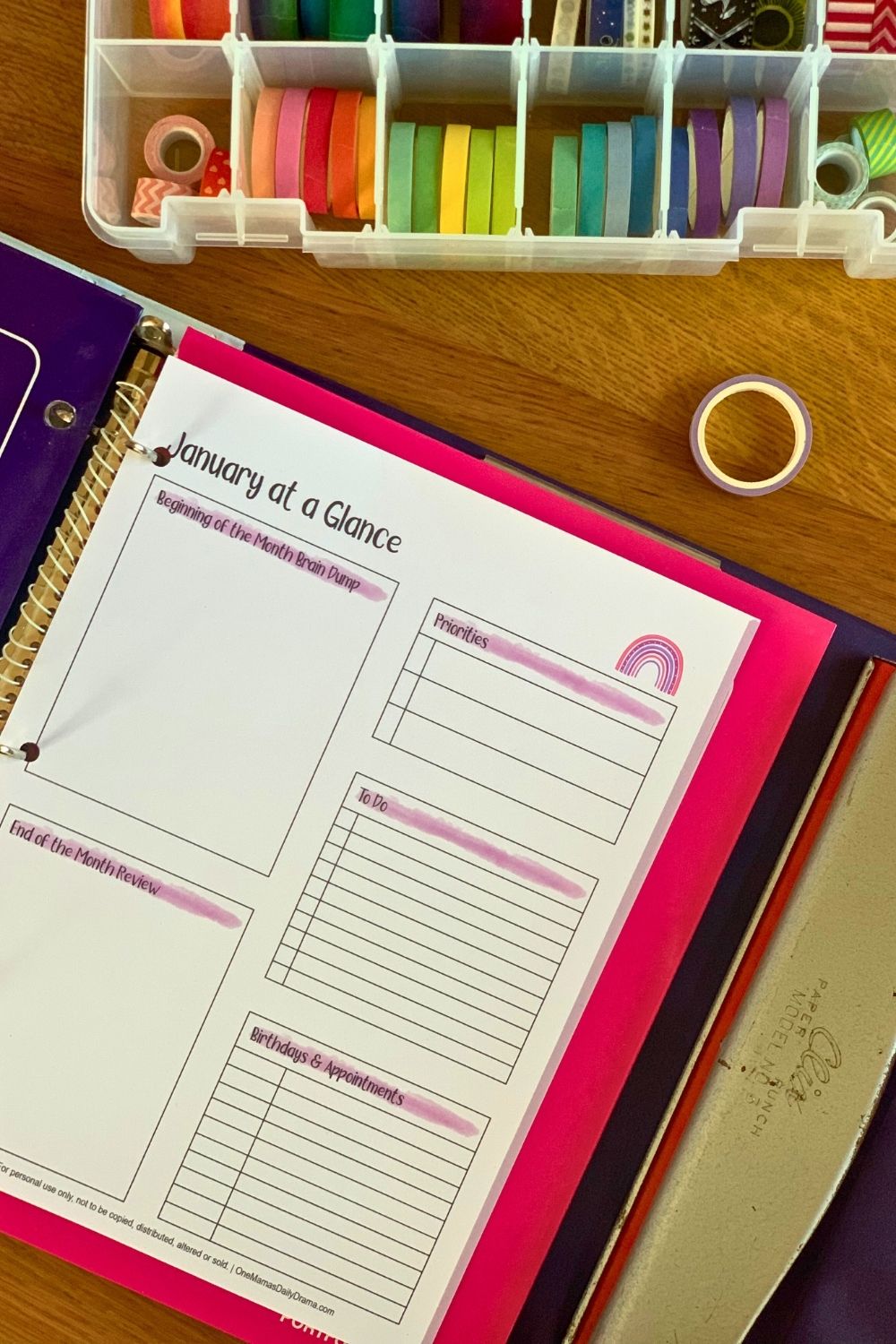 January at-a-glance dashboard page in a 3-ring binder.