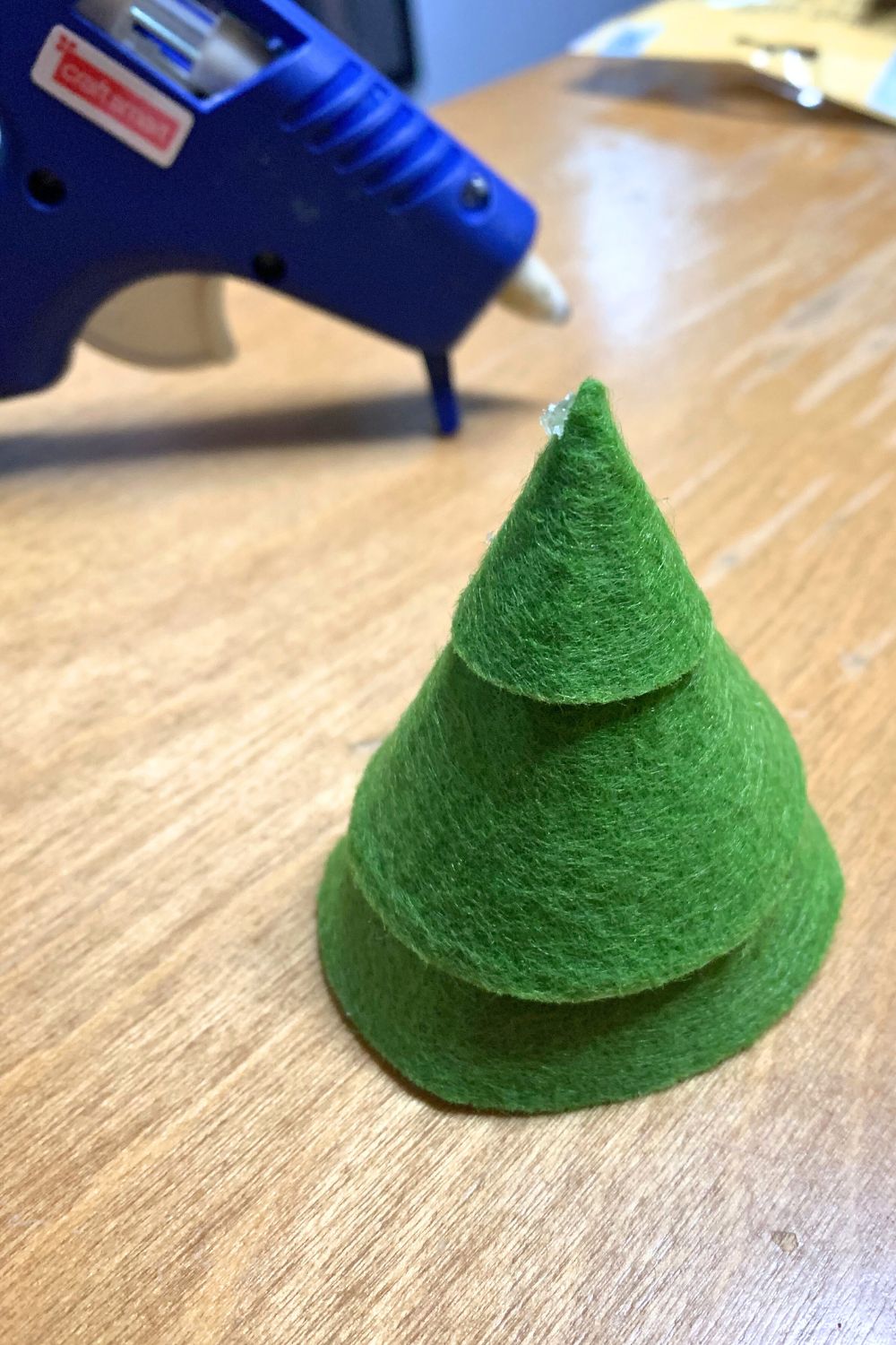 Three felt cones stacked to resemble a tree.