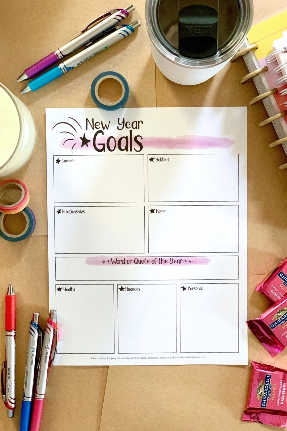 New Year's Goal printable worksheet with boxes for 7 categories: career, hobbies, relationships, home, health, finances, and personal - plus a word or quote of the year.