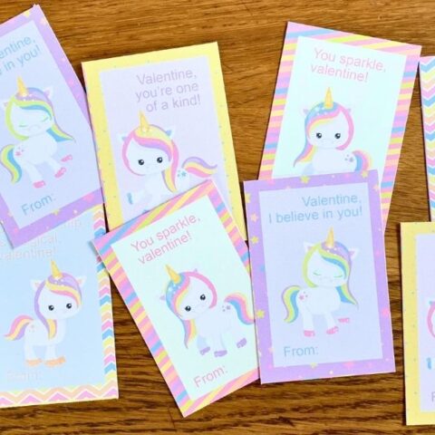 Printed rainbow unicorn valentine cards with cartoon clipart and sweet wishes.