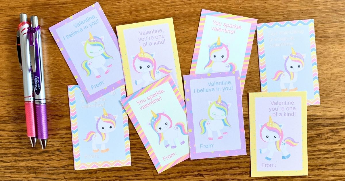 Printed rainbow unicorn valentine cards with cartoon clipart and sweet wishes.