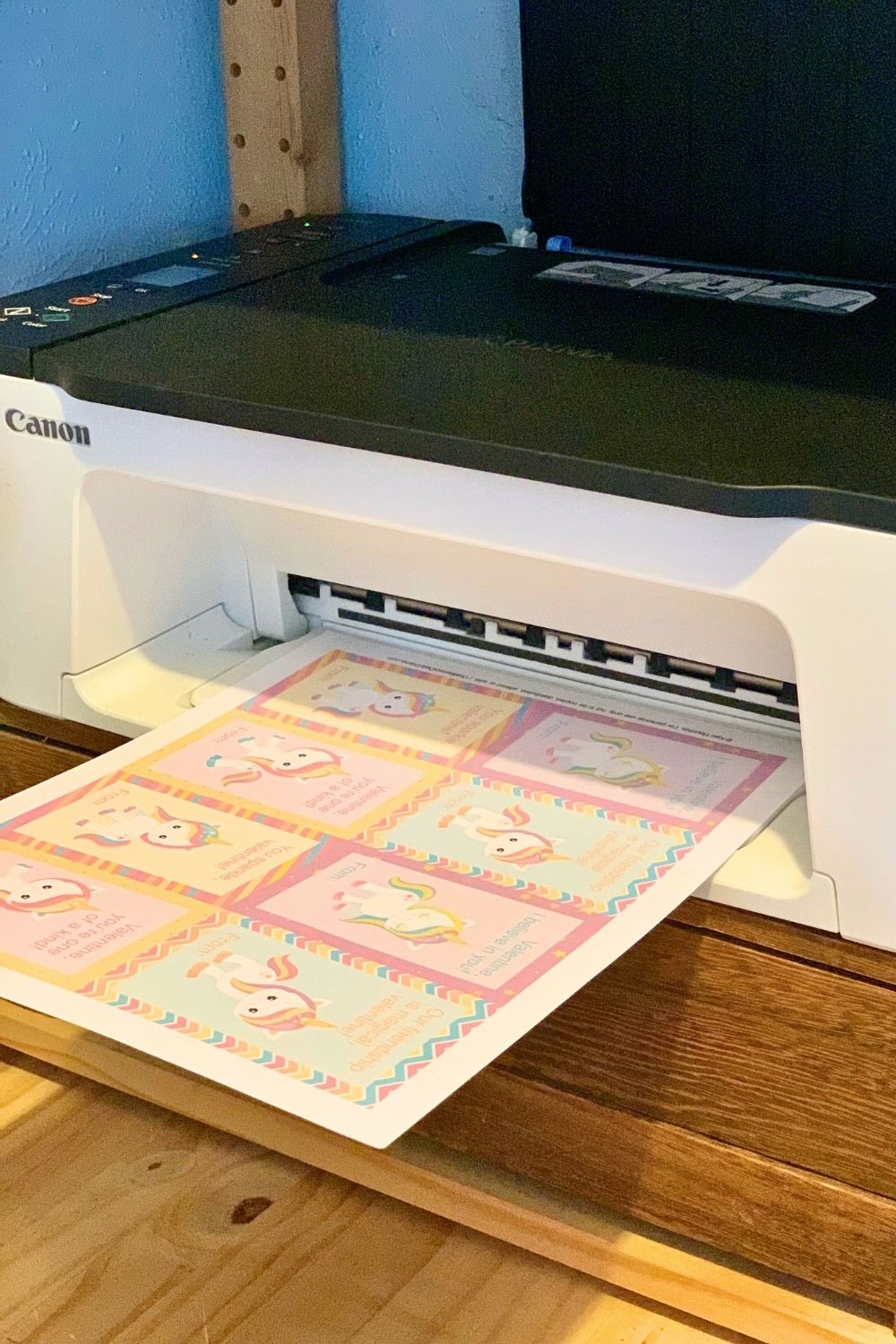 A computer printer printing the PDF file on card stock.