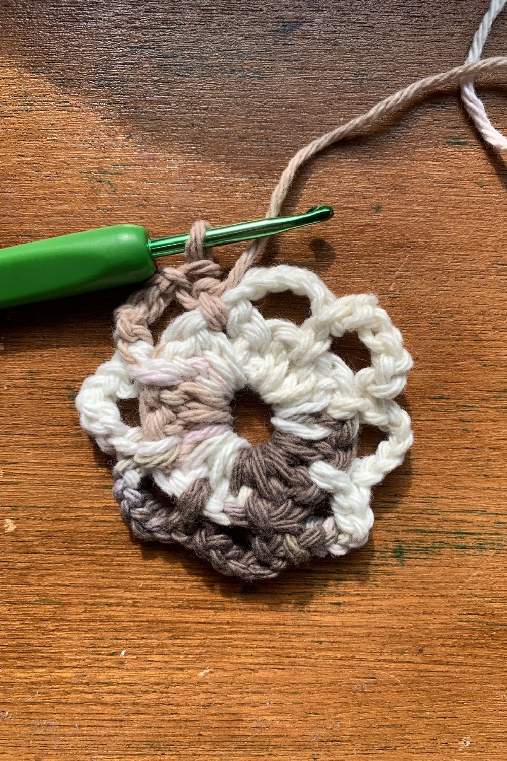 Ending a round of 8 single crochet loops.