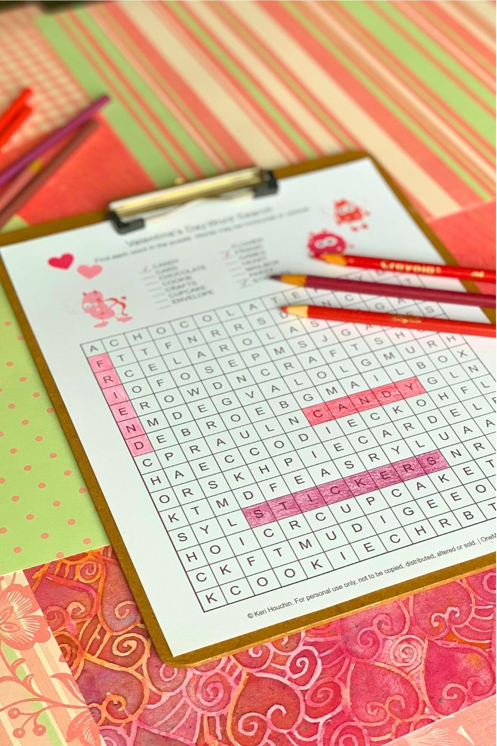 Colored pencils filling in boxes to find the hidden words.
