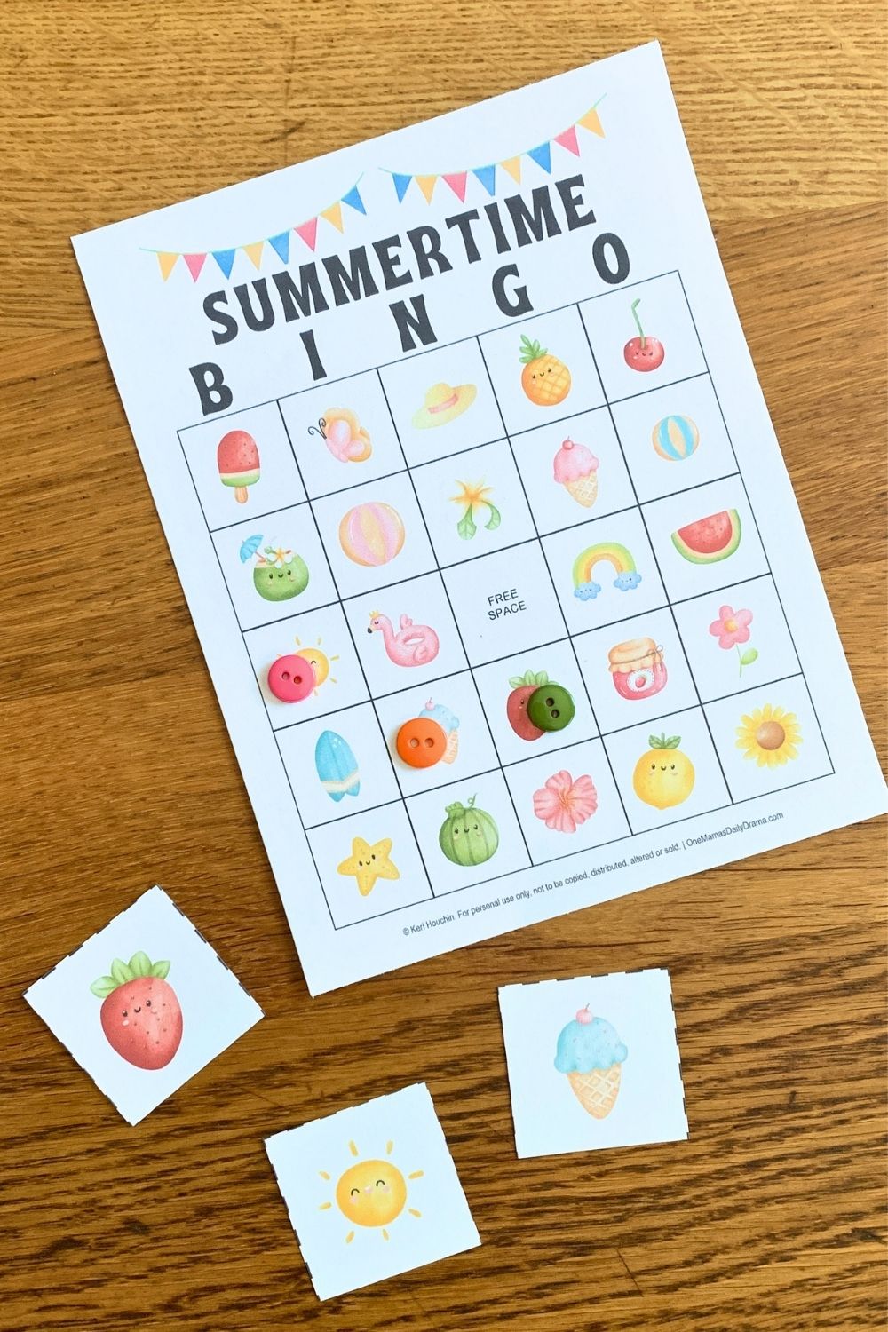 Summertime bingo card with buttons covering  tiles beside draw cards for a strawberry, sun, and ice cream cone.