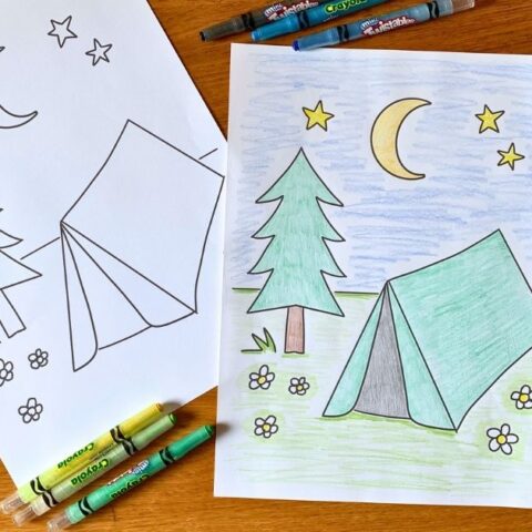 Colored and uncolored printable camping coloring page beside twistable crayons.