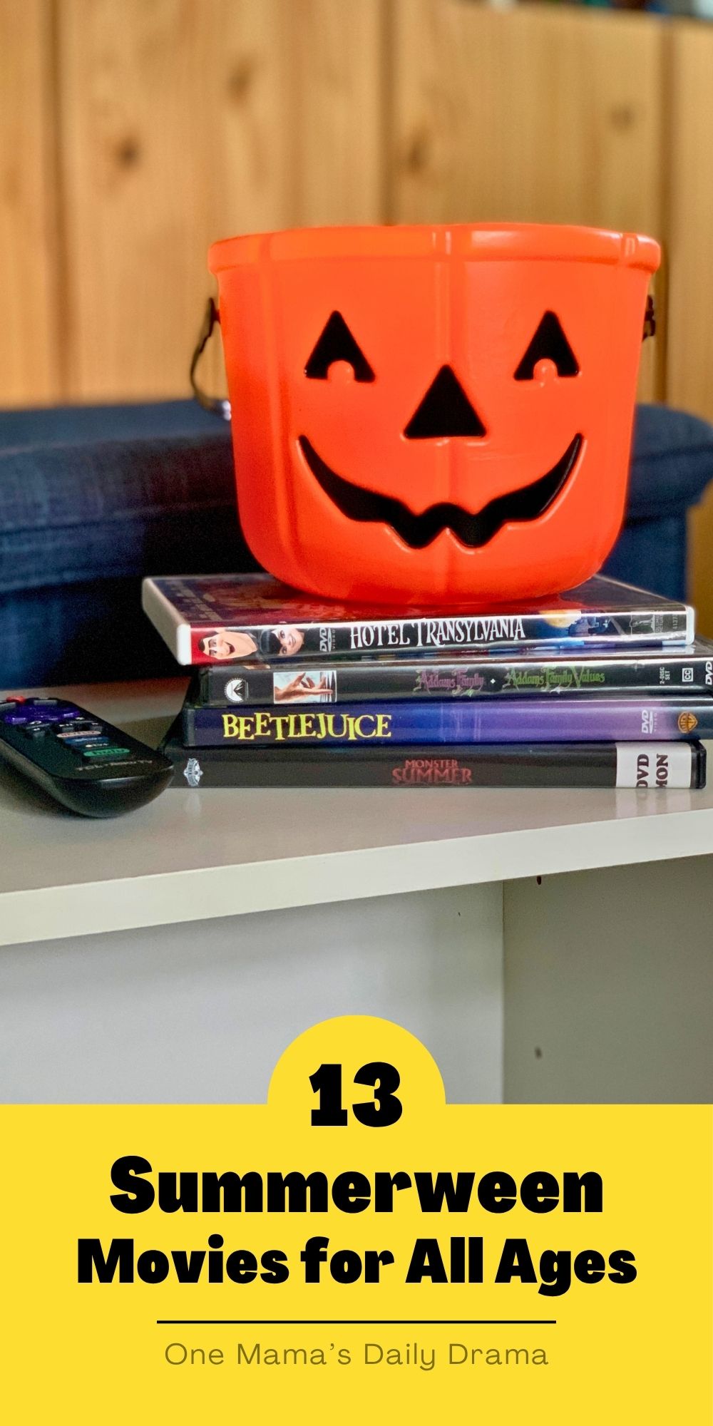 13 Summerween movies for all ages with a stack of DVDs including Hotel Transylvania, Addams Family Values, Beetlejuice, and Monster Summer.