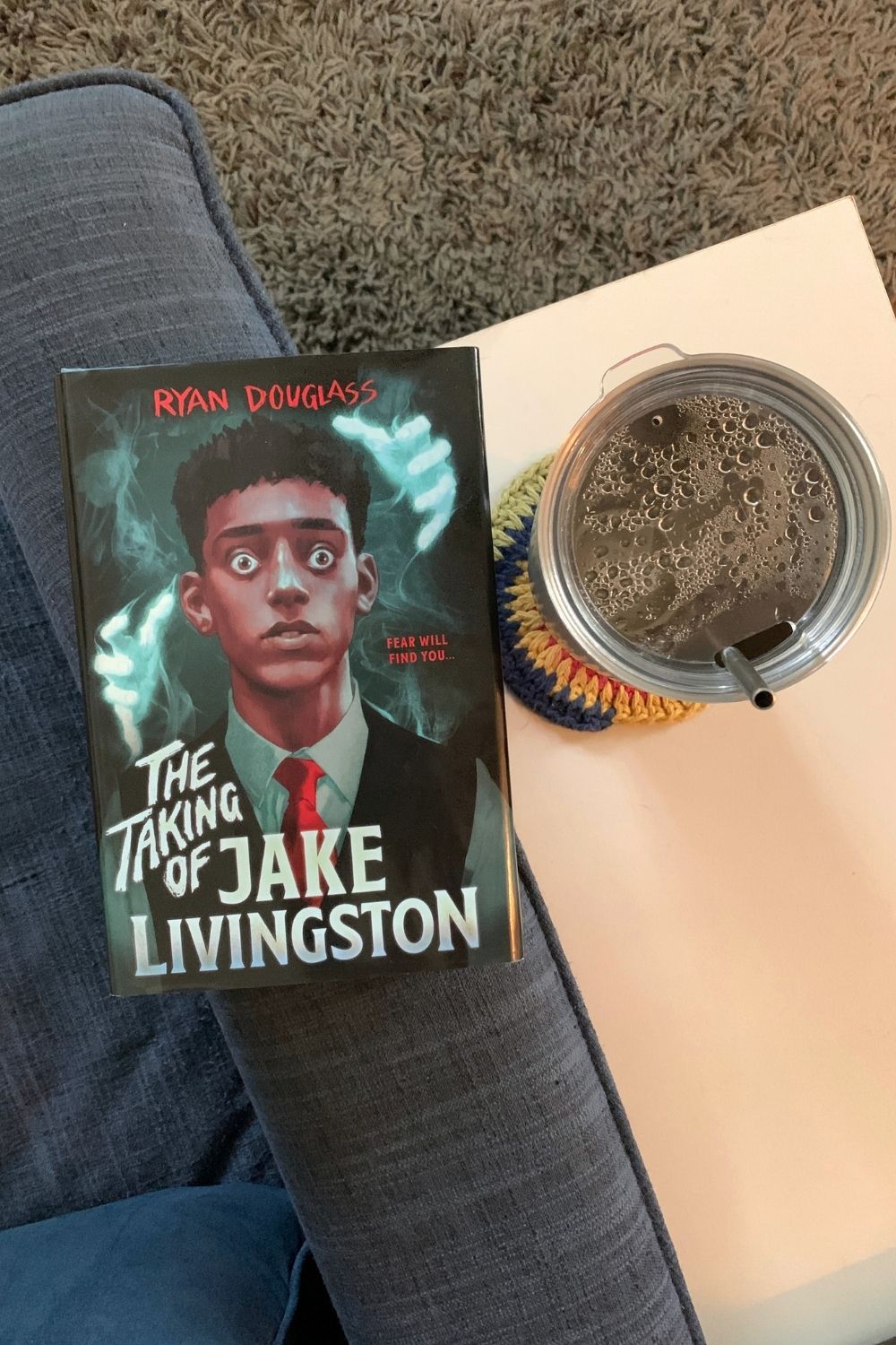 A hardcover book of The Taking of Jake Livingston by Ryan Douglass.
