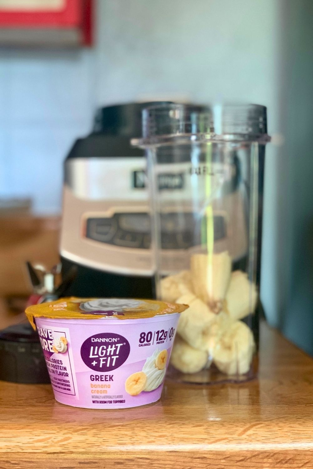 A cup of Dannon Light & Fit Banana Cream Pie yogurt.
