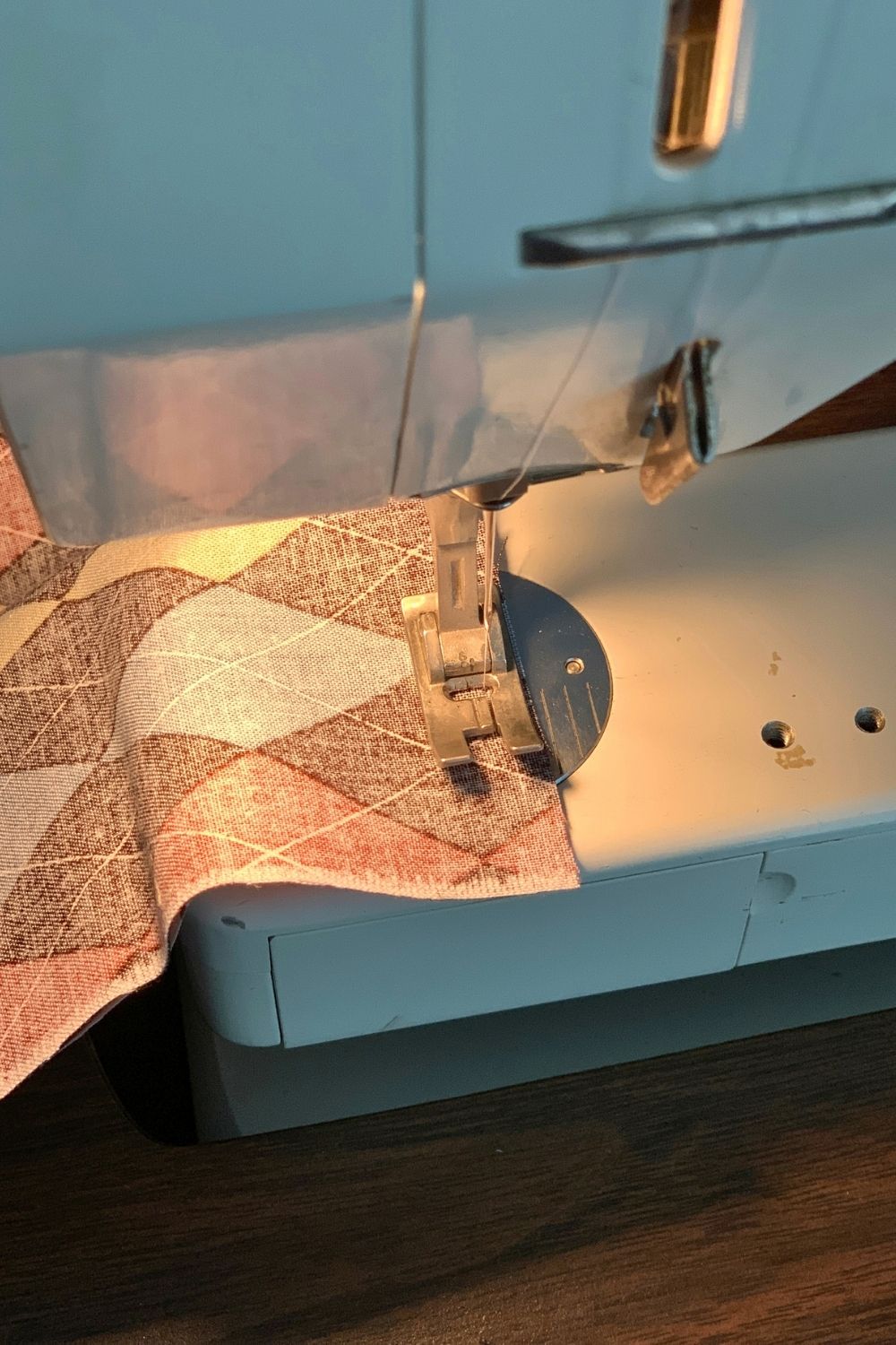 Sewing the edge of two pieces of fabric together, wrong side out.