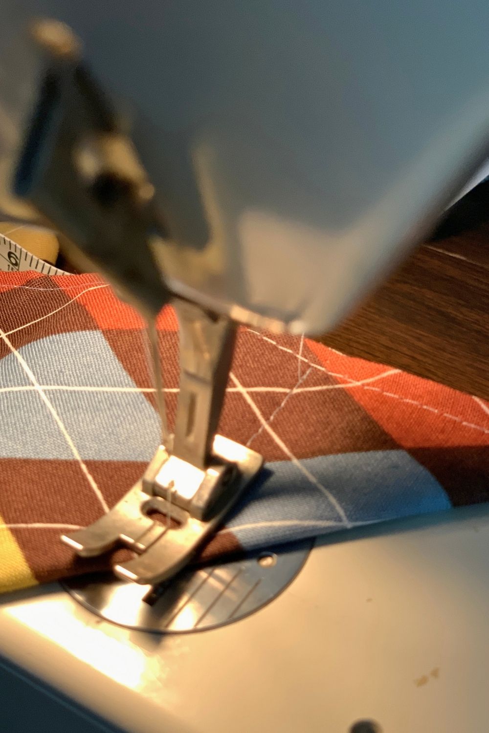 Stitching the corner of the fabric tray.