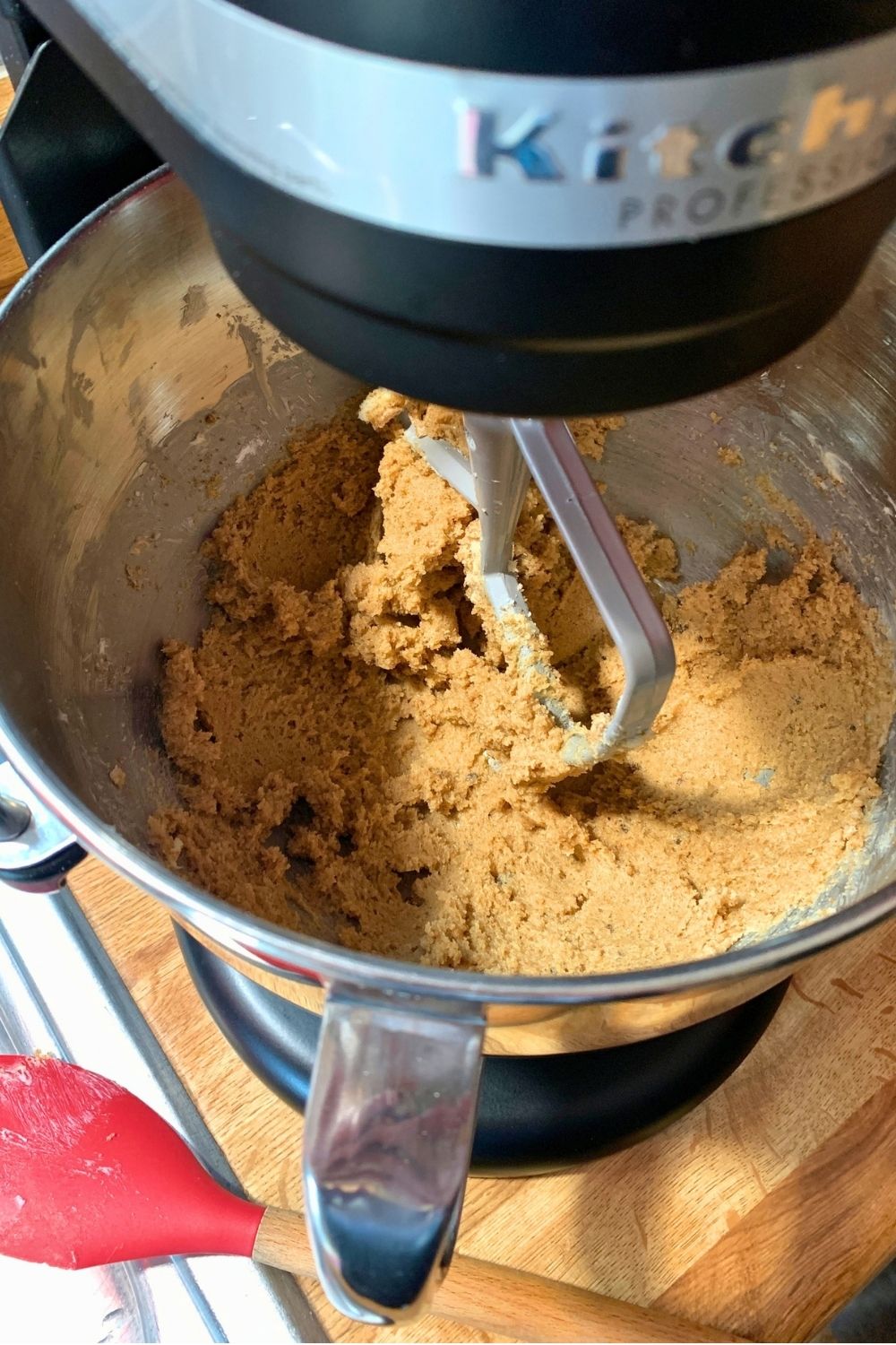 Butter and brown sugar creamed together in the bowl of a stand mixer.