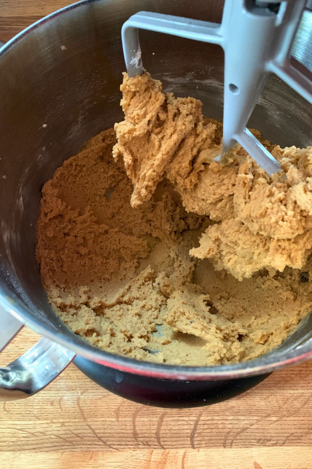 Flour blended into soft cookie dough.